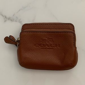 Used Coach small leather double zip wallet ( brown color )